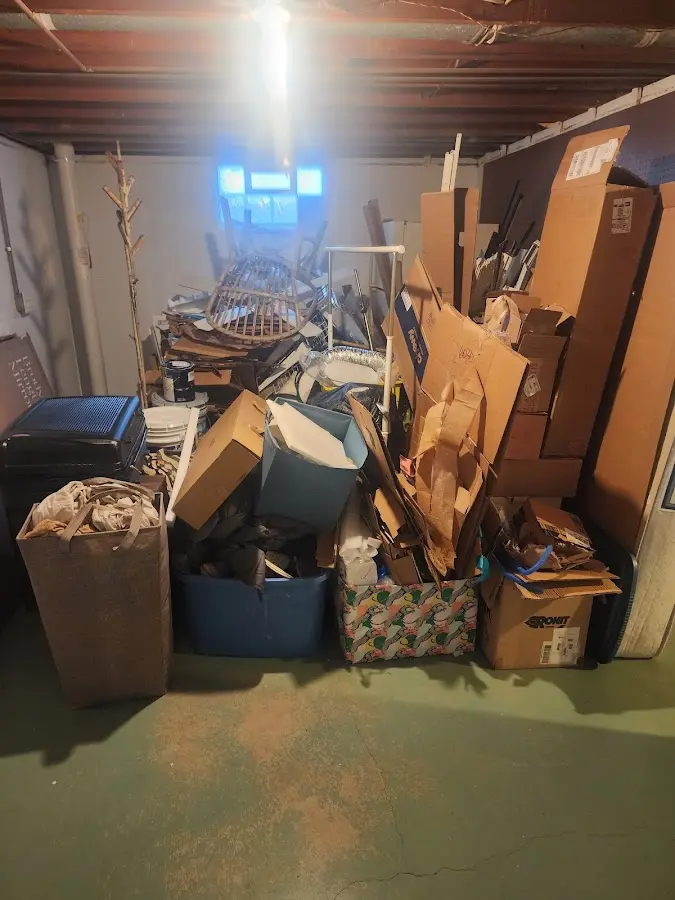 Roll-off dumpster container at job site for 8 Yard Dumpster Rental in Brick